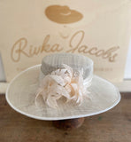 White wedding hat with silk band and feather flowers