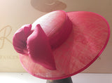 Red wedding hat with silk red bow.