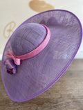 Pink and purple percher hat with pink silk cherry blossoms.rivka jacobs millinery Exeter Devon uk