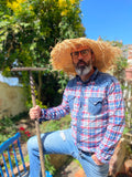 Straw sun hat with a large brim and a raw edge,