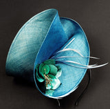 Turquoise blue fascinator, with blue leather rose and spray of feathers, perfect for ascot and weddings