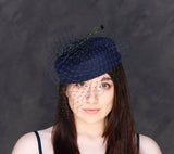 Peacock swords - navy blue pillbox hat. Rivka Jacobs, millinery