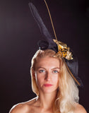black and gold fascinator