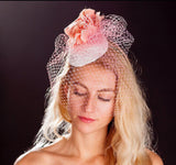 Pink bird cage veil, white lace base and pink rose fascinator. rivka jacobs millinery devon uk