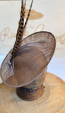 Brown saucer hat, pheasant feathers