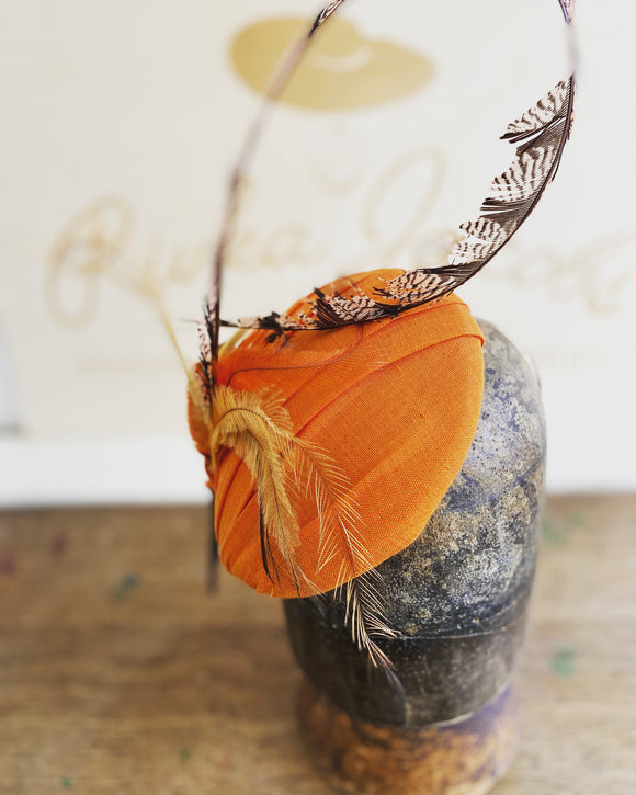 Orange and feather hatinator- for weddings, rivka jacobs- millinery