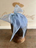 Light blue hatinator/beret with big silk bow
