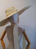 Large brimmed straw hat