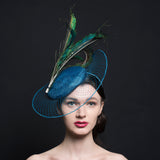 Sea Blue button beret, with blue veil stretch brim and peacock feathers, handmade in Exeter, Devon