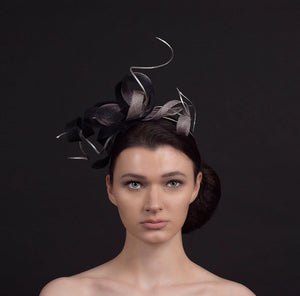  black and silver twisted fascinator with silver twirls, perfect for weddings and occasions