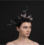 black and silver twisted fascinator with silver twirls, perfect for weddings and occasions