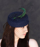 Peacock swords - navy blue pillbox hat. Rivka Jacobs, millinery