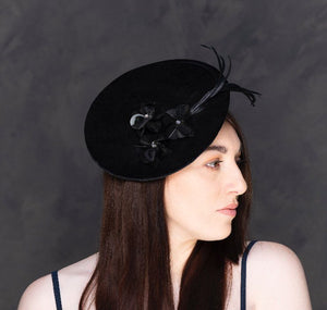 black velvet saucer hat, with feathers and flowers