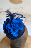 Navy blue and turquoise beret hat with silk flowers, feathers and veiling. rivka jacobs millinery